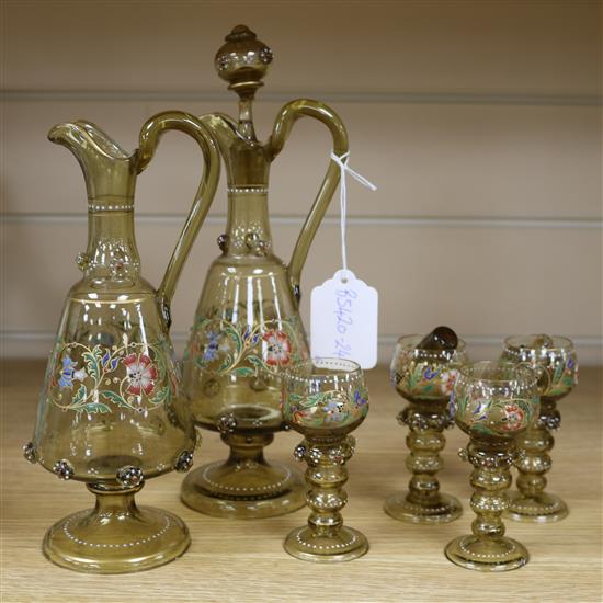 Two Bohemian enamelled glass liqueur jugs and four hock style liqueurs ewer 26cm